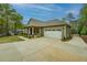 Charming craftsman-style home with a two-car garage and a manicured lawn at 9117 Dearing St, Covington, GA 30014