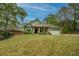 Traditional home features a manicured lawn, and a two car garage at 9117 Dearing St, Covington, GA 30014