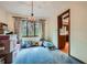 Bright dining room featuring a charming chandelier and a view of the yard at 103 Nob Hl, Peachtree City, GA 30269