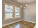 Bright dining area with hardwood floors and natural light at 158 Hemphill School Rd, Atlanta, GA 30331