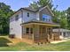 Charming new construction home with inviting front porch and traditional design at 158 Hemphill School Rd, Atlanta, GA 30331