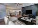 Open-concept living space with modern decor, seamlessly connected to the kitchen and dining area at 158 Hemphill School Rd, Atlanta, GA 30331