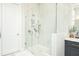 Modern bathroom featuring a large glass shower with built-in shelving and dual shower heads at 158 Village Green Ave, Woodstock, GA 30189