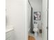 Cozy bathroom with a shower featuring stylish curtain and vanity, plus modern artwork and decor at 158 Village Green Ave, Woodstock, GA 30189