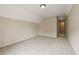 Spacious bedroom features a carpeted floor, neutral walls, and access to a hallway at 214 Cedar Woods Way, Canton, GA 30114