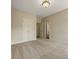 Bedroom featuring neutral carpet, overhead lighting, and ensuite bathroom access at 214 Cedar Woods Way, Canton, GA 30114