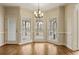 Sunny breakfast nook with hardwood floors and access to screened-in porch at 214 Cedar Woods Way, Canton, GA 30114