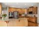Gourmet kitchen featuring custom cabinets, granite countertops and stainless appliances at 214 Cedar Woods Way, Canton, GA 30114