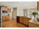 Well-appointed kitchen with custom cabinets, granite countertops, and stainless steel appliances at 214 Cedar Woods Way, Canton, GA 30114
