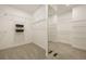 Large walk-in closet with ample shelving and mirror, providing organized storage space at 214 Cedar Woods Way, Canton, GA 30114
