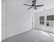 Neutral toned bedroom with ample natural light and carpeted floors at 7043 Foundry Dr, Woodstock, GA 30188