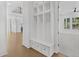 Mud room with built-in storage and access to the bedroom at 7043 Foundry Dr, Woodstock, GA 30188