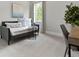 Cozy bedroom with soft carpet, natural light, daybed and accent chair at 3710 Near Star Ln, Cumming, GA 30028