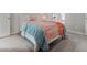 Bedroom features a window, carpet floor and a made bed with colorful bedspread at 3710 Near Star Ln, Cumming, GA 30028