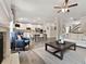 Spacious living room and dining room features an open concept design with hardwood floors at 3710 Near Star Ln, Cumming, GA 30028