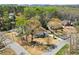 An aerial view of a home surrounded by lush greenery in a neighborhood setting at 495 Heritage Way, Atlanta, GA 30328