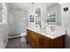 Modern bathroom with a double sink vanity, walk-in shower, and sleek finishes at 495 Heritage Way, Atlanta, GA 30328