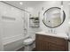 Stylish bathroom with subway tiles, a soaking tub, and modern fixtures at 495 Heritage Way, Atlanta, GA 30328