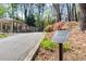 Exterior view of a tennis court and playground dedicated to Bill Humphlett at 495 Heritage Way, Atlanta, GA 30328