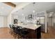 Updated kitchen featuring granite countertops, stainless steel appliances, and a large island with barstool seating at 495 Heritage Way, Atlanta, GA 30328