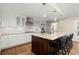 Spacious kitchen featuring granite countertops, stainless steel appliances, and an island with barstool seating at 495 Heritage Way, Atlanta, GA 30328