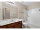 Clean bathroom with tiled shower, standard vanity, and an open mirror at 923 Port West Dr, Auburn, GA 30011