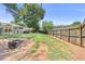Spacious backyard with lush lawn and a built-in fire pit, offering endless outdoor possibilities at 1531 Stone Gate Se Ln, Atlanta, GA 30317