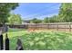 Large backyard featuring a lush lawn and fire pit, perfect for outdoor gatherings at 1531 Stone Gate Se Ln, Atlanta, GA 30317