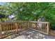 Outdoor deck offering scenic views of lush greenery and trees, perfect for relaxation and entertainment at 1531 Stone Gate Se Ln, Atlanta, GA 30317