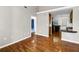 Inviting living room featuring gleaming hardwood floors and an open layout with views to kitchen at 1531 Stone Gate Se Ln, Atlanta, GA 30317