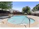 Refreshing community pool featuring a gentle waterfall feature and lush landscaping, creating a tranquil oasis at 1531 Stone Gate Se Ln, Atlanta, GA 30317