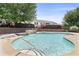 Sparkling pool with waterfall feature offers a refreshing escape in this community at 1531 Stone Gate Se Ln, Atlanta, GA 30317