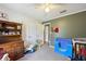 Bedroom with soft gray carpet, dresser and closet at 419 Fincher Rd, Covington, GA 30016