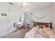 Bedroom with carpet, natural light, ceiling fan and soft blue walls at 419 Fincher Rd, Covington, GA 30016