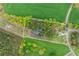 Aerial view of land plot lines, pond, house, and dense green trees on an expansive plot at 190 Ccc Rd, Kingston, GA 30145