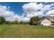 Spacious backyard with well-maintained lawn, perfect for outdoor activities and relaxation with attached garage at 190 Ccc Rd, Kingston, GA 30145