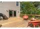 Wooden deck featuring outdoor seating and a grill, perfect for entertaining at 190 Ccc Rd, Kingston, GA 30145