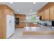 This eat-in kitchen offers stainless steel appliances, solid surface counter tops, and tile floors at 190 Ccc Rd, Kingston, GA 30145