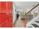 Bright foyer leading to an open floor plan with hardwood floors, staircase, and ample natural light at 230 Silver Fox Trl, Dallas, GA 30157