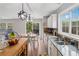 Bright kitchen features granite countertops, a wood island, and stainless steel sink at 230 Silver Fox Trl, Dallas, GA 30157