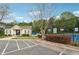 Tennis courts and neighborhood clubhouse with marked parking spaces at 230 Silver Fox Trl, Dallas, GA 30157
