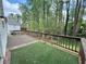 Spacious deck overlooking a wooded lot providing backyard privacy at 3150 Berkshire Manor Dr, Alpharetta, GA 30022