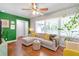 Cozy living room with hardwood floors, large windows, comfortable seating, and modern decor at 3385 Pinehill Dr, Decatur, GA 30032