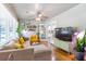 Stylish living room featuring hardwood floors, large windows, modern furnishings, and French doors at 3385 Pinehill Dr, Decatur, GA 30032
