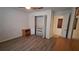 Bedroom featuring wood-look flooring, closet, and natural light at 340 Teal Ct, Roswell, GA 30076
