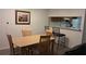 Bright dining room featuring wooden table and chairs next to a passthrough to the kitchen at 340 Teal Ct, Roswell, GA 30076