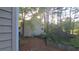 Exterior view of the home featuring balconies and lush greenery at 340 Teal Ct, Roswell, GA 30076