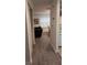 Hallway featuring modern gray flooring leading into the home's living space at 340 Teal Ct, Roswell, GA 30076