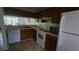 Functional kitchen featuring ample counter space and essential white appliances at 340 Teal Ct, Roswell, GA 30076