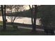 Lake view with benches and a walking path, perfect for relaxation at 340 Teal Ct, Roswell, GA 30076